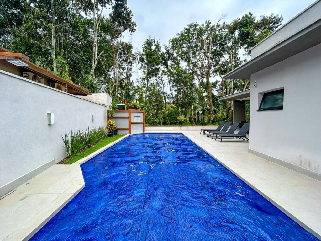 Casa com 5 dormitórios à venda, 310 m² por R$ 4.400.000,00 – Riviera Módulo 30 – Bertioga/SP