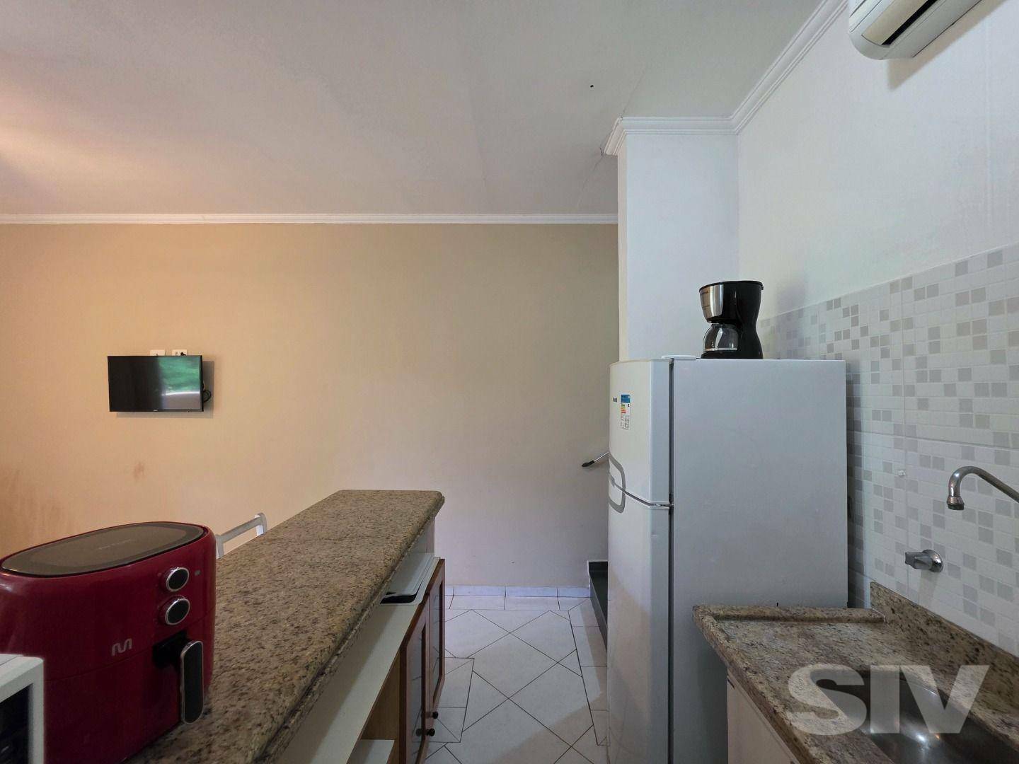 Village com 1 dormitório à venda, 55 m² por R$ 900.000,00 – Riviera Módulo 30 – Bertioga/SP