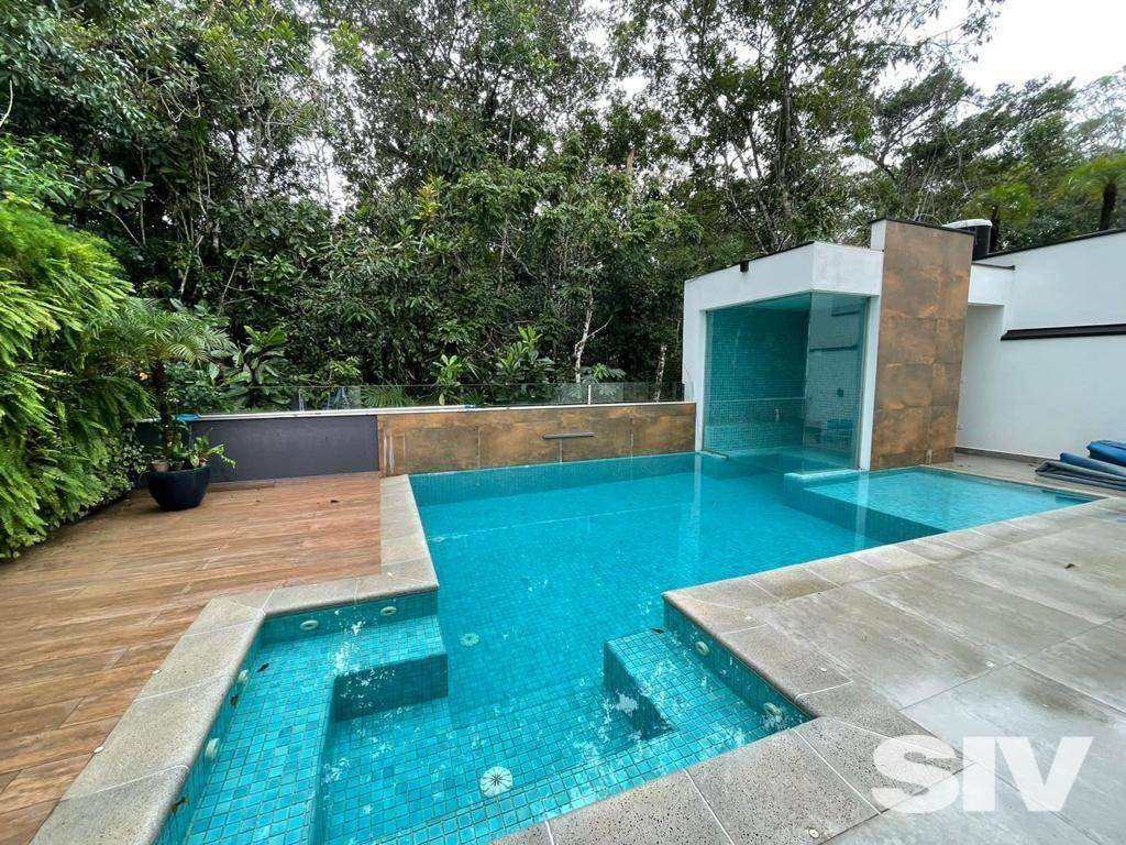 Casa com 5 dormitórios à venda, 450 m² por R$ 6.500.000,00 - Riviera Módulo 24 - Bertioga/SP