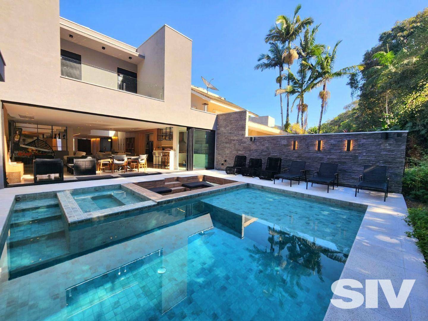 Casa com 5 dormitórios à venda, 335 m² por R$ 7.500.000,00 - Riviera Módulo 21 - Bertioga/SP