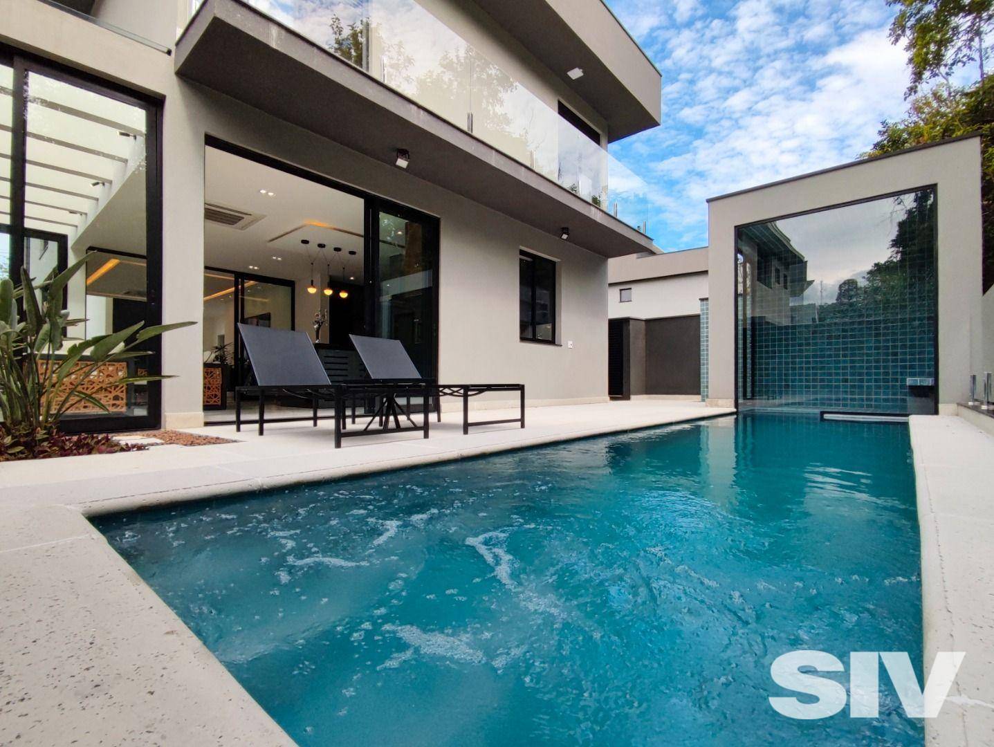 Casa com 5 dormitórios à venda, 335 m² por R$ 6.500.000,00 - Riviera Módulo 24 - Bertioga/SP