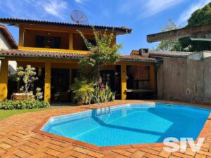 Casa com 8 dormitórios à venda, 288 m² por R$ 2.450.000,00 - Riviera Módulo 22 - Bertioga/SP