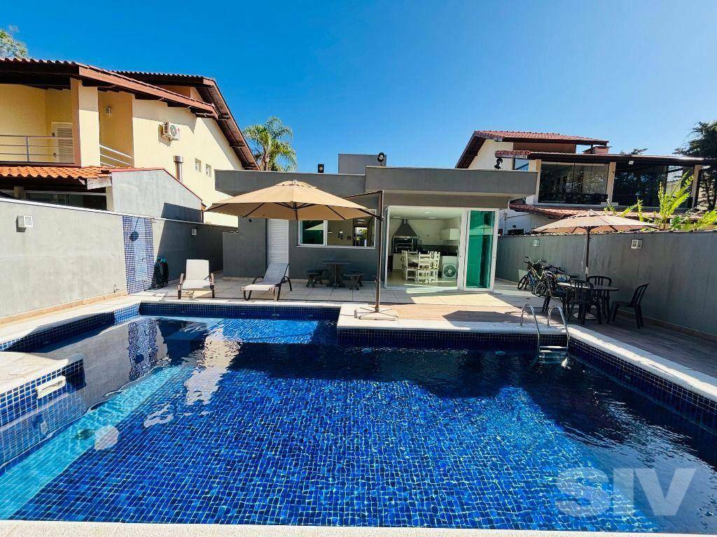 Casa com 3 dormitórios à venda, 312 m² por R$ 3.400.000,00 - Riviera Módulo 20 - Bertioga/SP