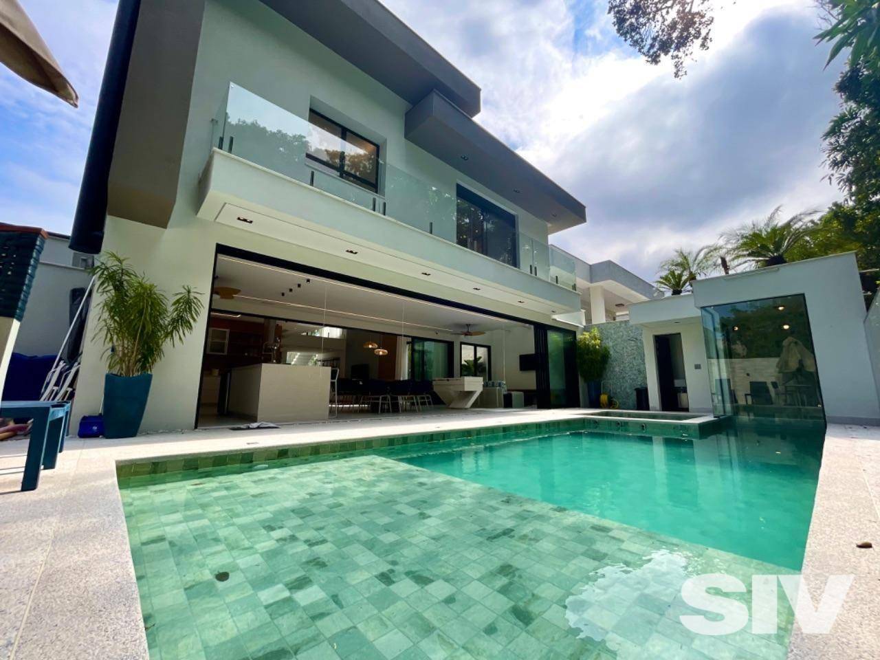 Casa com 5 dormitórios à venda, 396 m² por R$ 8.000.000,00 - Riviera Módulo 24 - Bertioga/SP