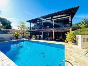 Casa com 5 dormitórios à venda, 317 m² por R$ 3.200.000,00 - Riviera Módulo 20 - Bertioga/SP