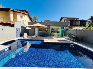 Casa com 3 dormitórios à venda, 312 m² por R$ 3.200.000,00 - Riviera Módulo 20 - Bertioga/SP