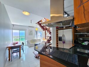 Cobertura com 1 dormitório à venda, 77 m² por R$ 1.600.000,00 - Riviera Módulo 6 - Bertioga/SP