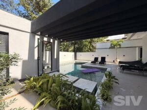 Casa com 5 dormitórios à venda, 329 m² por R$ 10.900.000,00 – Riviera Módulo 21 – Bertioga/SP