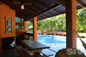 Casa com 5 dormitórios à venda, 430 m² por R$ 6.200.000,00 – Riviera – Módulo 26 – Bertioga/SP
